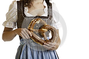 Bavarian girl holding Oktoberfest Pretzel