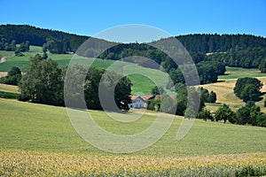 Bavarian landscape with a farm