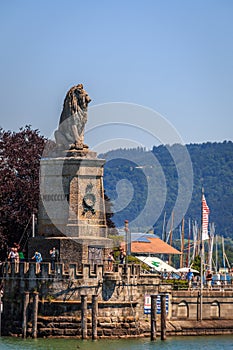 The Bavarian lion in the harbor entrance of the island Lindau, Bavaria, Germany