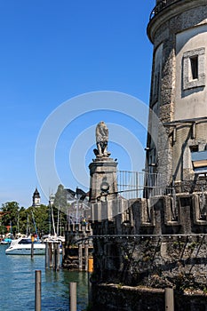 The Bavarian lion in the harbor entrance of the island Lindau, Bavaria, Germany