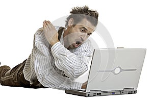 Bavarian Man is angry on his laptop photo