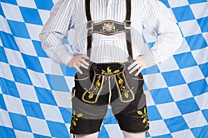 Bavarian man with black Oktoberfest lederhose photo