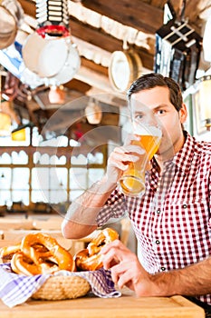 Bavarian man drinking wheat beer