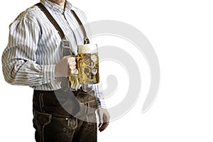 Bavarian man hold beer stein at Oktoberfest