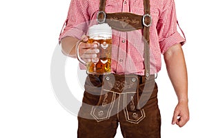 Bavarian man holds Oktoberfest beer stein photo