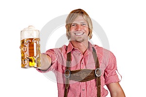 Bavarian man holds oktoberfest beer stein