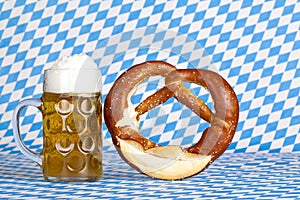 Bavarian oktoberfest beer stein with pretzel