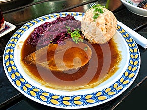 Bavarian Sauerbraten of beef, red cabbage photo