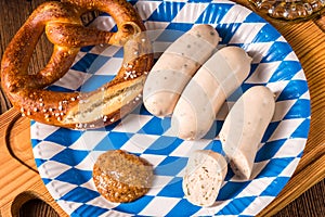 Bavarian sausage with pretzel, sweet mustard