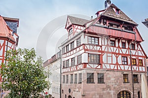 Bavarian traditional houses called fachwerkhaus. Medieval architecture. Exterior of ancient timbered buildings. Nuremberg landmark