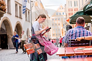 Bavarian waitress outdoors