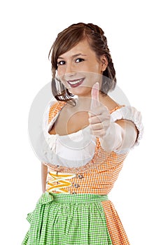 Bavarian woman in dirndl shows thumb up