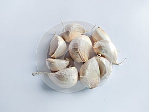 Bawang putih or garlic on white background photo