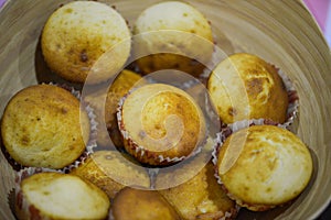 Bawl of homemade plain baked cupcakes photo