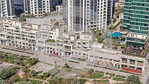 Bay Avenue Park near modern residential and office complex aerial timelapse at Business Bay