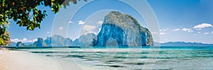 Bay beach and mountains isles panorama in Palawan Philippines Islands view from turquoise shallow sea at sunny day