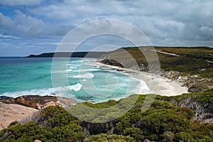 Bay with beach, trees and waves in Western Australia