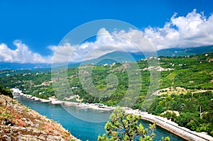 Bay of the Black Sea with villages on the hillside. Crimea