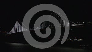 Bay Bridge lights at night in San Francisco, California