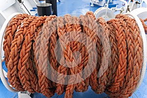 a bay with a cable on the ship. mooring rope