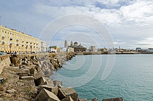 Bay of Cadiz with its waterfront promenade Avenida Campo del Sur and the Cadiz Cathedral