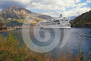 View of cruise ship Rhapsody of the Seas . Montenegro, Bay of Kotor