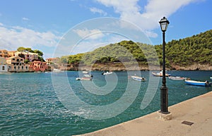 Bay and lamp on embankment. Assos, Kefalonia, Greece