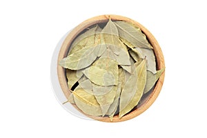 Bay leaves in bawl isolated on white background