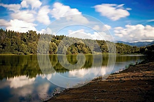 The bay with a mirror on the water level at the Liptovska Mara dam