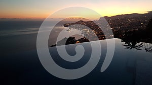 Bay and Port of Funchal Madeira Portugal Infinity Pool at Dusk