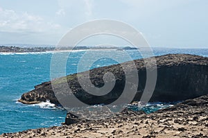 Bay and Rugged Shoreline by Cueva del Indio photo
