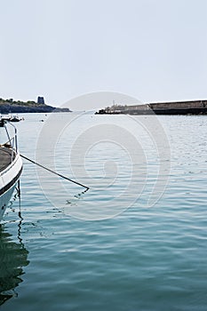 The bay's foreland with port entrance's breakwater. Seaside.