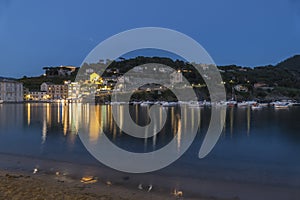 The bay of silence in Sestri Levante illuminated at twilight