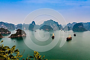 The bay of Titov Island with cruise junk boats, Halong Bay, Vietnam