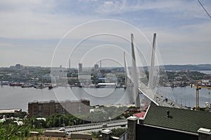 Bay view in Vladivostok, Russia. Warships and fishing ships, boats in marina, port