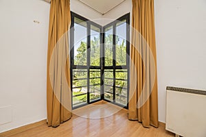 Bay window of a house in the corner of a room