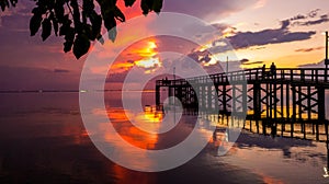 Bayfront Park pier on Mobile Bay at sunset