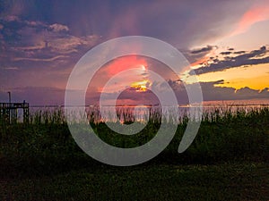 Bayfront Park pier on Mobile Bay at sunset