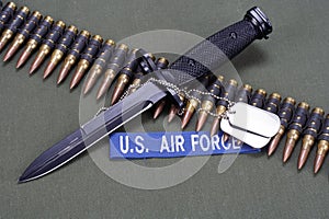 bayonet and ammunition belt on US AIR FORCE uniform