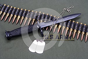 bayonet, dog tags and ammunition belt on US ARMY uniform