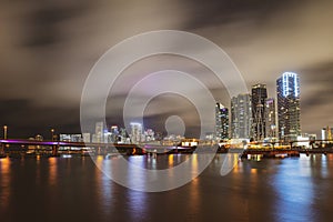 Bayside Miami Downtown MacArthur Causeway from Venetian Causeway. Miami night downtown.