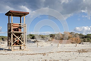 Baywatch tower at the sunny sand beach