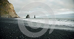 Bblack sand beach and it`s rock formations Reynisfjara, Vik Iceland Reynisfjara Beach.