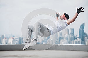 Bboy doing some stunts on the roof