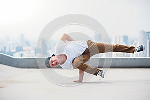 Bboy doing some stunts on the roof