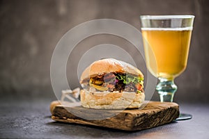 BBQ beef bun and glass of Ale