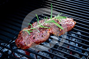 BBQ Beef Steak On Grill With Rosemary Pepper And Salt - Barbecue
