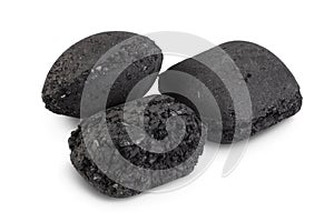 Bbq charcoal briquette isolated on white background with clipping path and full depth of field