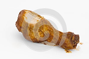 BBQ chicken drumsick with bite taken