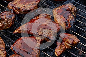 BBQ Chicken on Grill.